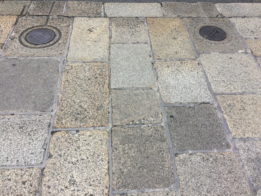 Wide shot Coal Hole Covers in Granite CH iron covers 13